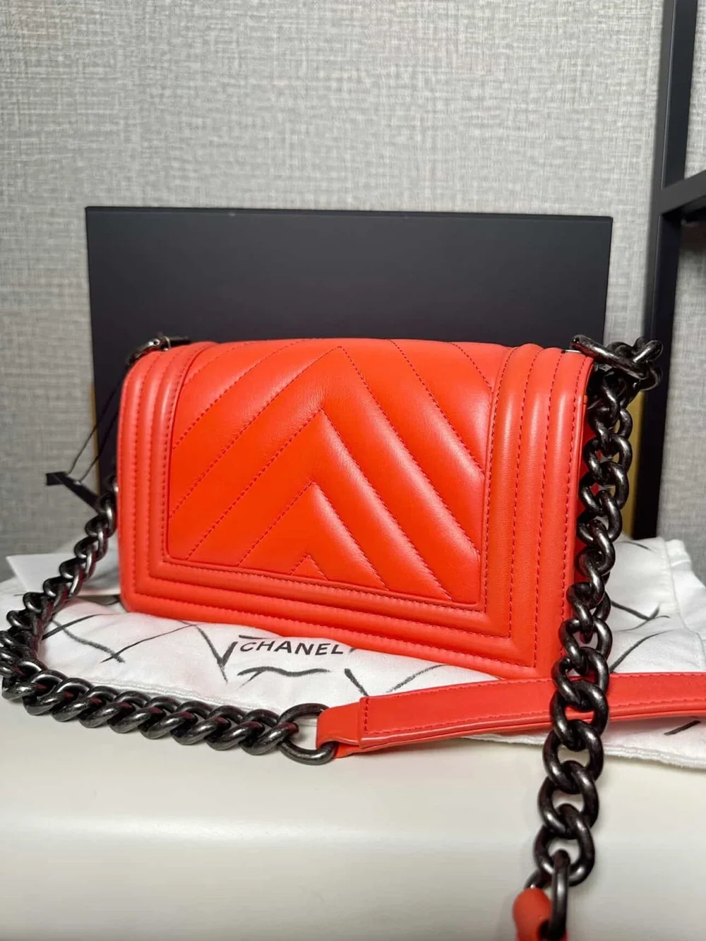 CHANEL Quilted Chevron Leather Boy Bag - Coral